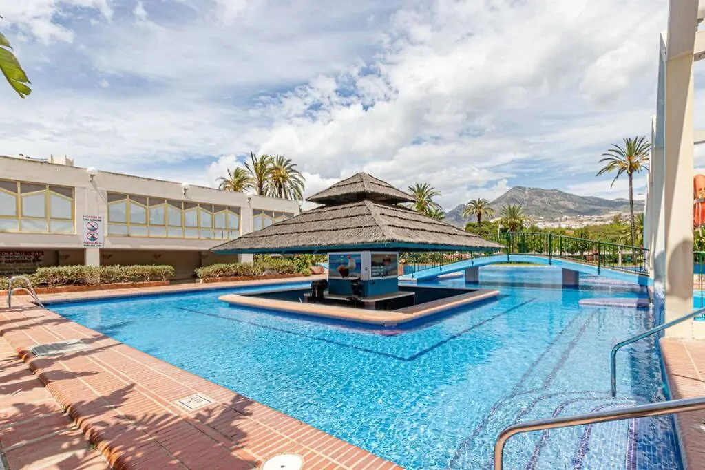 797 Holiday Rentals- Precioso piso con vistas al jardin en Benalbeach Benalmádena